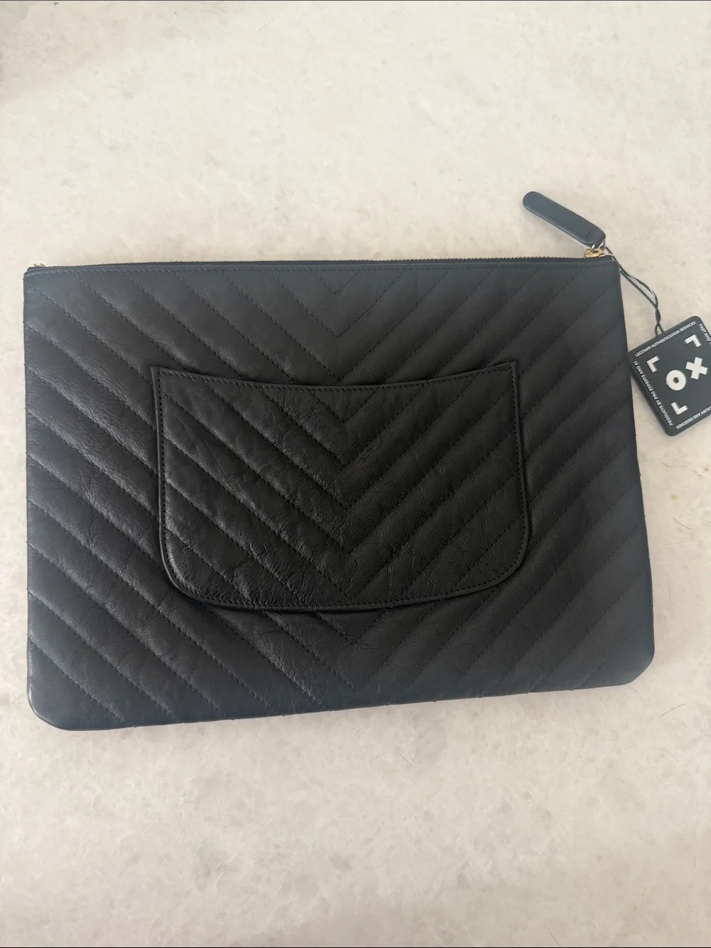 CHANEL Black Chevron Quilted Leather Zip Pouch with Gold CC